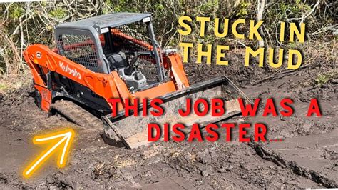 skid steer stuck in the mud